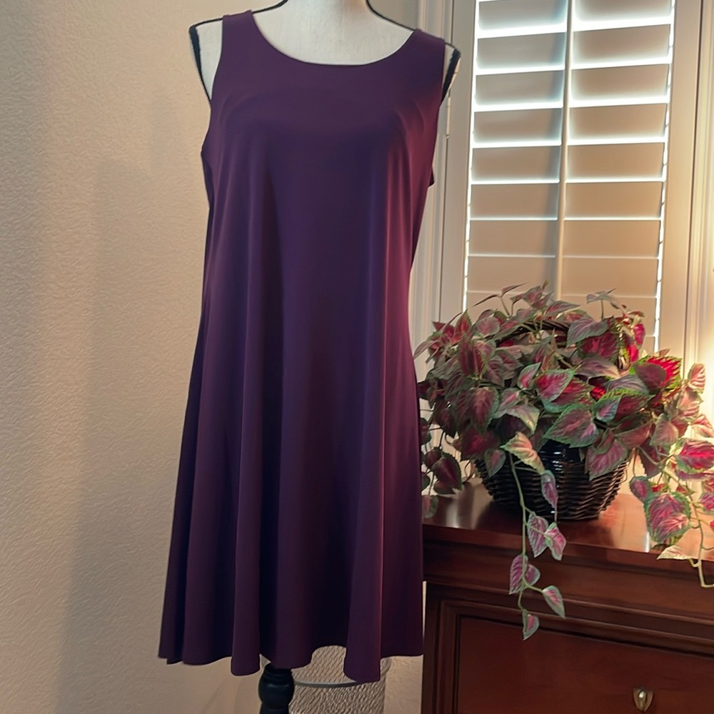 Nine West Medium plum colored sleeveless swing dress.Easy peasy pull over style.